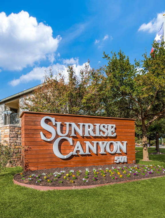 the sign for sunrise canyon in front of the sunrise canyon office building at Sunrise Canyon, Universal City, TX, 78148