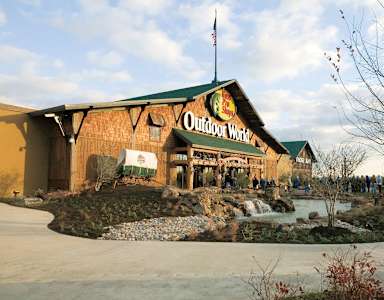 A building with the words Outdoor World on it.