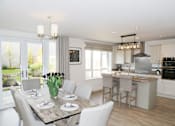 Thumbnail 2 of 4 - the kitchen and dining area of a house
