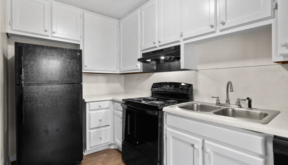 Kitchen with Black Appliances  at Alcovy Terrace, Covington
