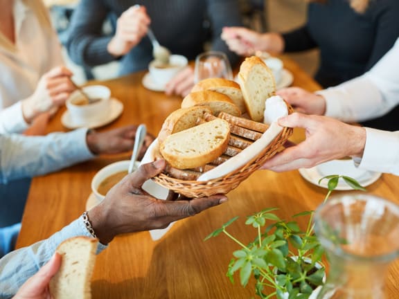 A lifestyle photo of friends enjoying dinner out