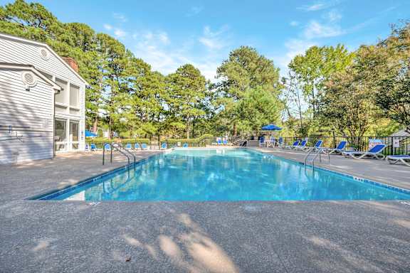 Swimming pool and sundeck at Huntington Apartments in Morrisville, North Carolina