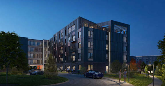 a rendering of an apartment building at night