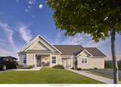 Thumbnail 4 of 6 - a house with a lawn and a tree