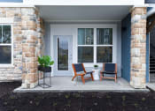 Thumbnail 22 of 28 - a patio with chairs and a table on a porch at Estraya Boerne, Texas