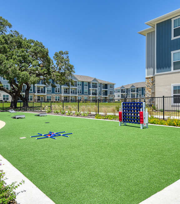 A gym with a blue, green and yellow ball.