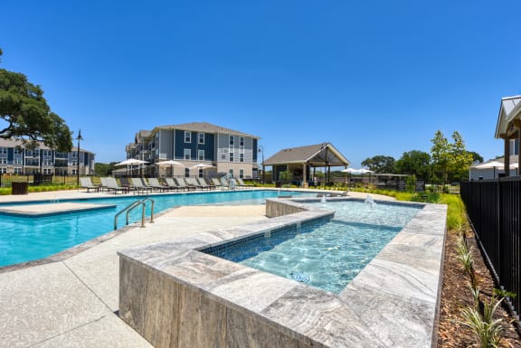the preserve at ballantyne commons pool and spa with apartments in the background