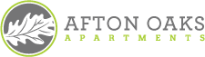 A logo with a leaf design and the text "Afton Oaks Apartment".