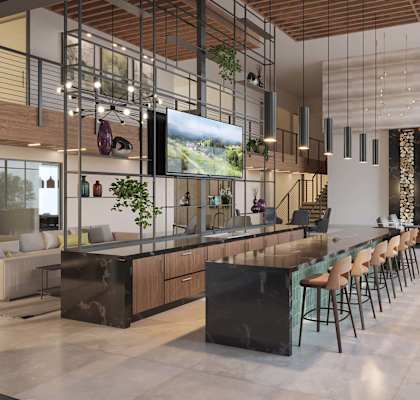 A modern kitchen with a bar area and a dining table.at Elysium, Phoenix, 85054
