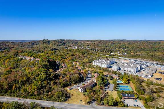 A bird's eye view of a residential area with a large building and a swimming pool at Landmark at Lyncrest Reserve Apartments, Nashville, TN