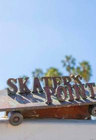 Skaters point Skateboard at Alena on Haley, Santa Barbara, CA