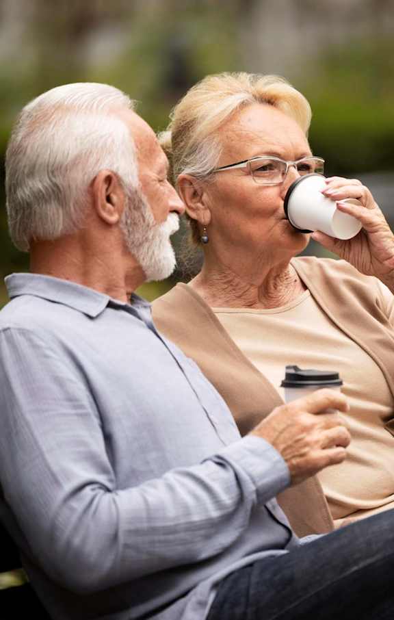 Old Couple Sitting at Cottages at Johnston Commons, Johnston, IA
