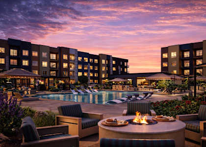 Poolside patio with firepit at Avela Luxury Apartments, Nevada