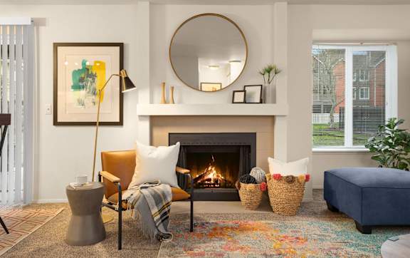 Living room with fireplace at Bower Village Apartments, Kent, WA