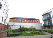 Thumbnail 3 of 6 - the building in which the apartment is located