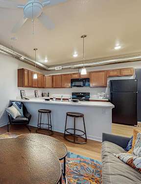 Living room along with Kitchen at Melbourne Apartments, Des Moines, Iowa