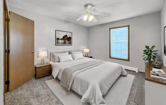 a bedroom with a bed and a ceiling fan at Creekstone Falls, South Dakota, 57106