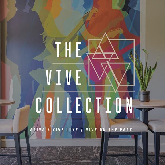 the vine collection graphic on a wall with tables and chairs