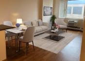Thumbnail 4 of 9 - Dining Area and Living Room