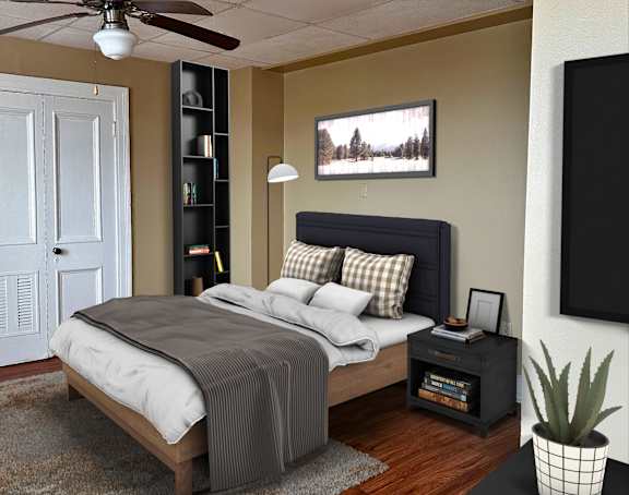 a bedroom with a bed and a ceiling fan