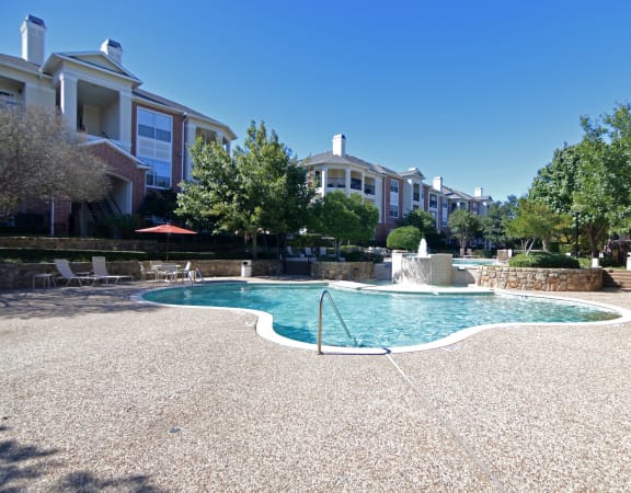 the preserve at ballantyne commons community pool and fountain with apartment buildings