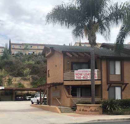 a building with a sign that reads north coast hot dog cafe