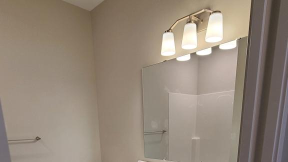 an overhead view of a bathroom with a toilet and a sink