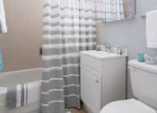 Thumbnail 10 of 39 - Bathroom shot with cabinetry and shower at Eden Commons, Chicago, 60616