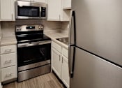Thumbnail 26 of 45 - kitchen with stainless steal appliances