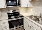 Thumbnail 27 of 45 - kitchen with stainless steal appliances