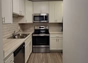 Thumbnail 3 of 45 - kitchen with stainless steal appliances