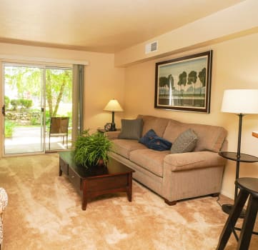Apartment Living Room Leading to Private Patio