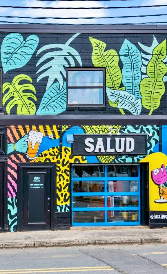 a mural on the side of a building at The Collection Charlotte in Charlotte, NC, 28205