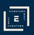 a blue and white square with the word downtown and the letter e in the middle