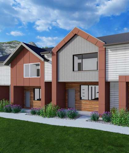 A modern house with a grey roof and brown sidings.