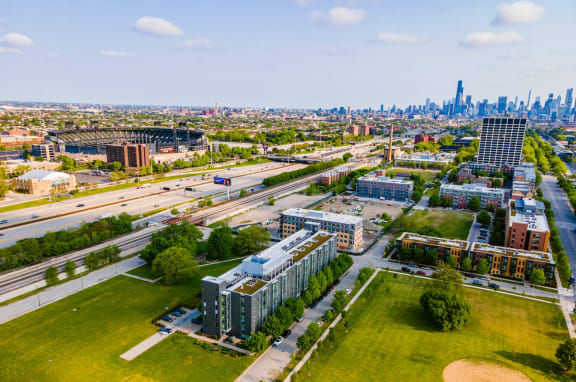 the view of the city from the balcony of a condominium building