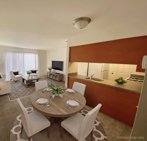 Kitchen with Living Room View at The Landings Apartments, Westland, MI