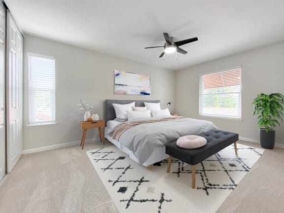 a bedroom with a bed and a ceiling fan at Valley Plaza Villages, Pleasanton, 94566