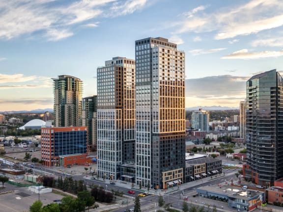 an aerial view of the city with tall skyscrapers at BLVD Beltline, Calgary, AB