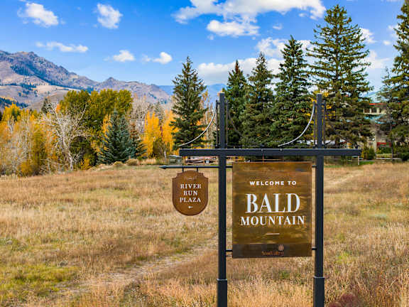 A sign welcoming visitors to Bald Mountain stands in a field at The Woods at Copper Ranch, Hailey, Idaho