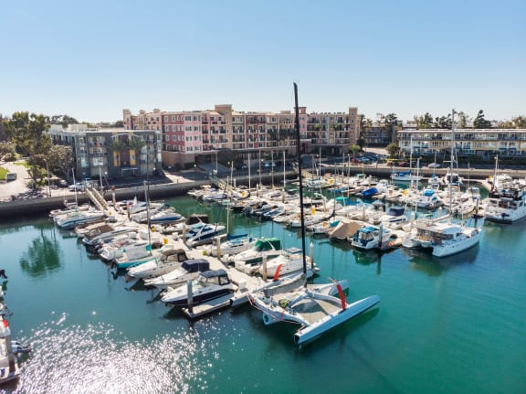 a marina filled with lots of boats and buildings at Marina Harbor, Marina del Rey, California