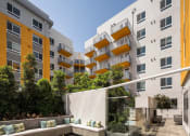 Thumbnail 9 of 27 - Courtyard with seating