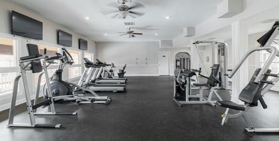 the gym at the enclave at woodbridge apartments in sugar land, tx