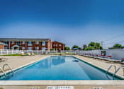 Thumbnail 5 of 8 - A pool with a no diving sign in the foreground.