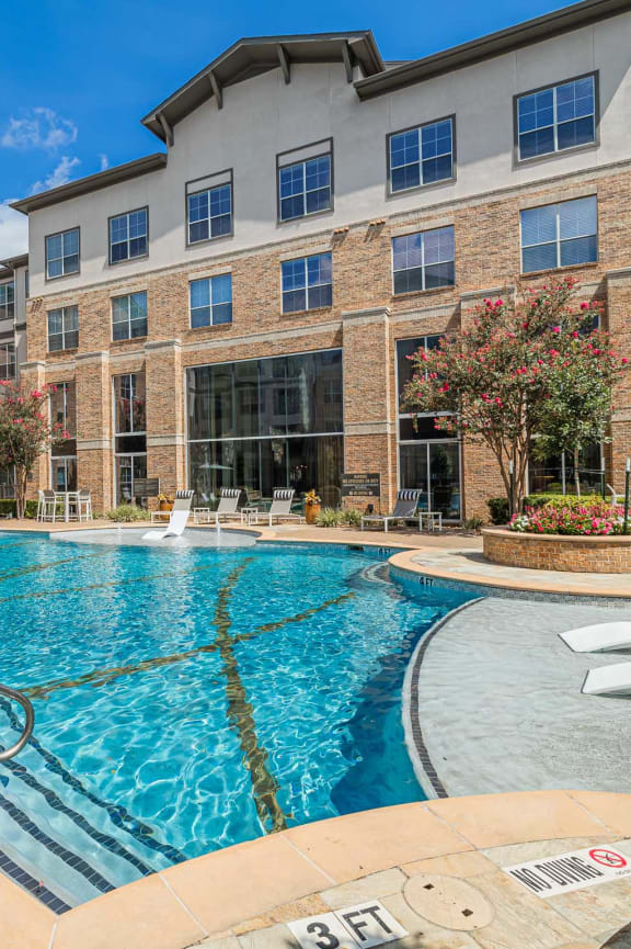 our apartments offer a swimming pool in front of our building at Auxo at Memorial, Houston, TX