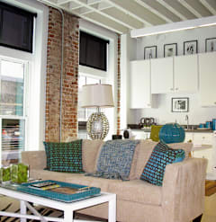 Living Area With Kitchen at Lofts at Union Alley, Memphis, TN, 38103