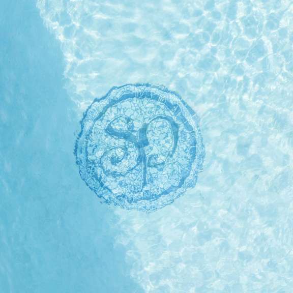 a blue swimming pool with a circle of water in it