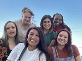 a group of people posing for a picture