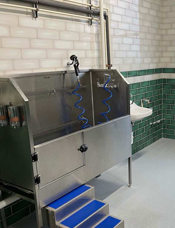Pet friendly community featuring Fresh Paws Pet Spa, which includes a pet washing station, grooming table and dryer at 42 Hundred On The Lake, St Francis