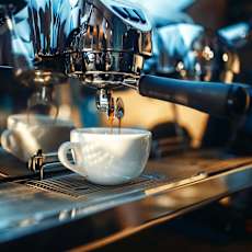 A coffee machine is dispensing coffee into a white cup.